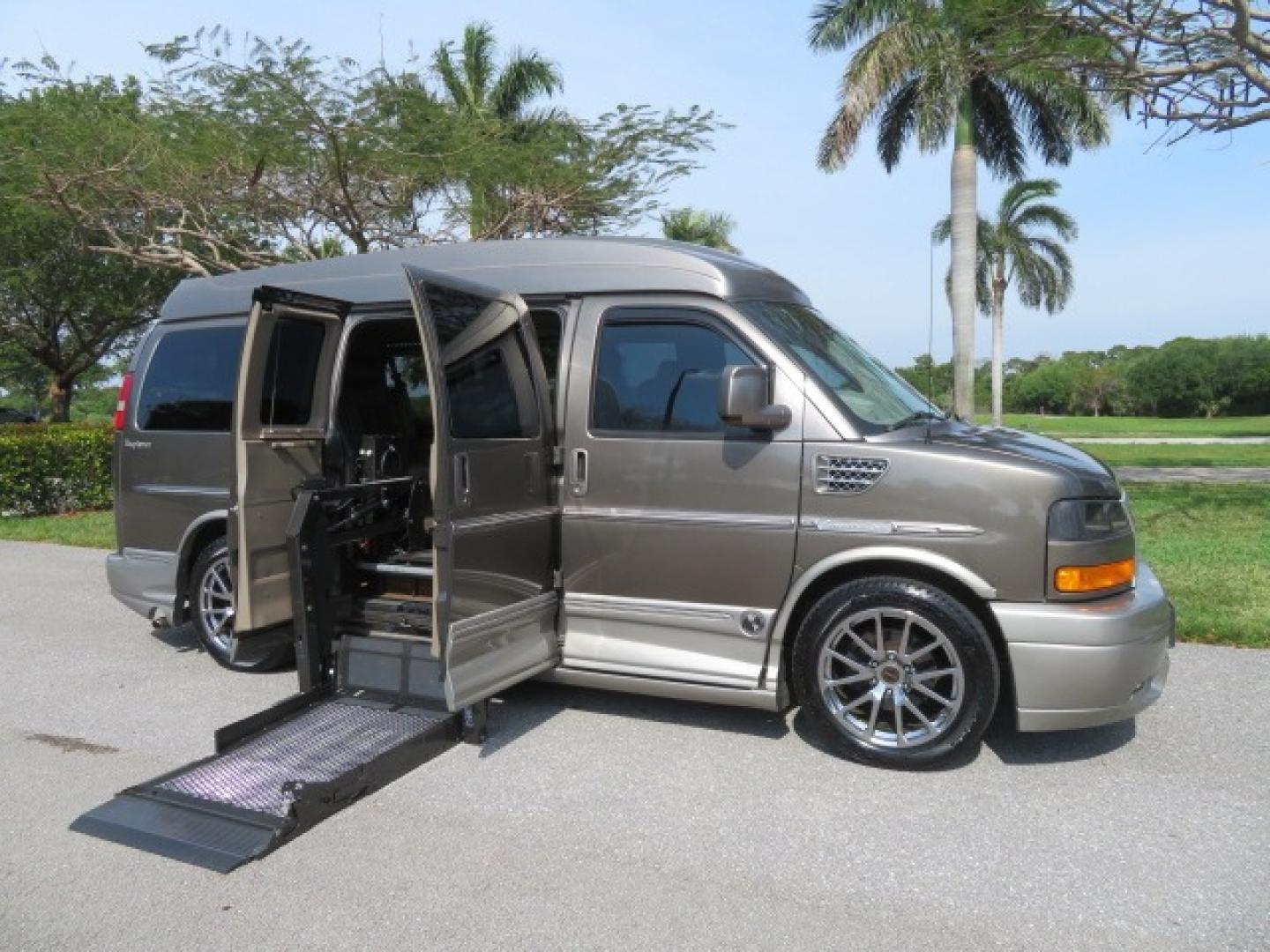 2013 /Beige Two Tone GMC Savana RV G1500 3LT (1GDS7DC45D1) with an 5.3L V8 OHV 16V engine, 4-Speed Automatic transmission, located at 4301 Oak Circle #19, Boca Raton, FL, 33431, (954) 561-2499, 26.388861, -80.084038 - You are looking at a Gorgeous 2013 GMC Savana 1500 High Top Conversion Van Explorer Limited SE Package Handicap Wheelchair Conversion Van with 72K Original Miles, Side Entry Braun Millennium Series Wheelchair Lift, Rubber Floor, Q-Straint Tie Down System, Navigation, Back Up Camera, Huge flat Screen - Photo#41